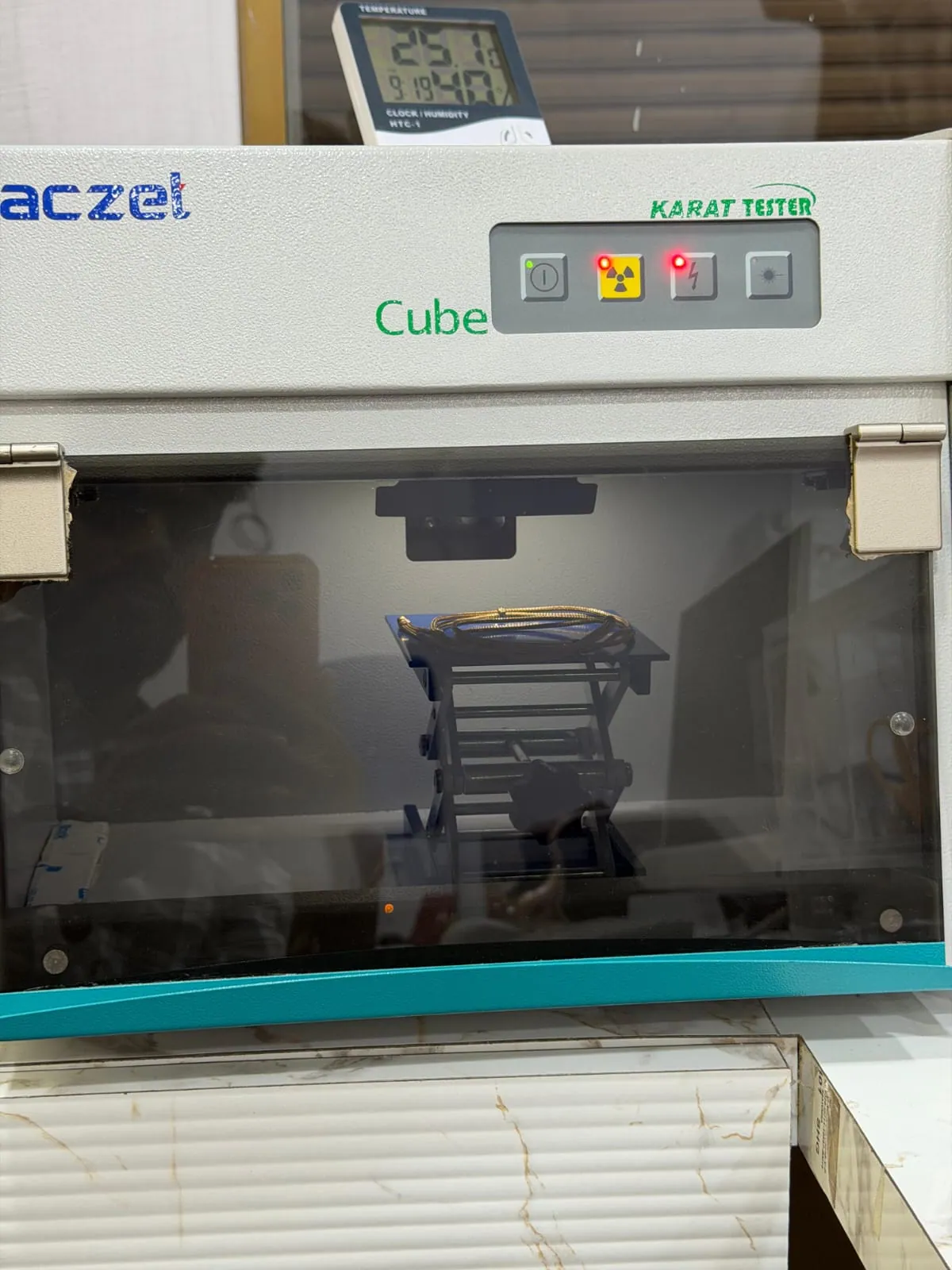 Aczel Cube XRF Karat Tester machine used at Rithika Gold Hyderabad for precise gold purity testing