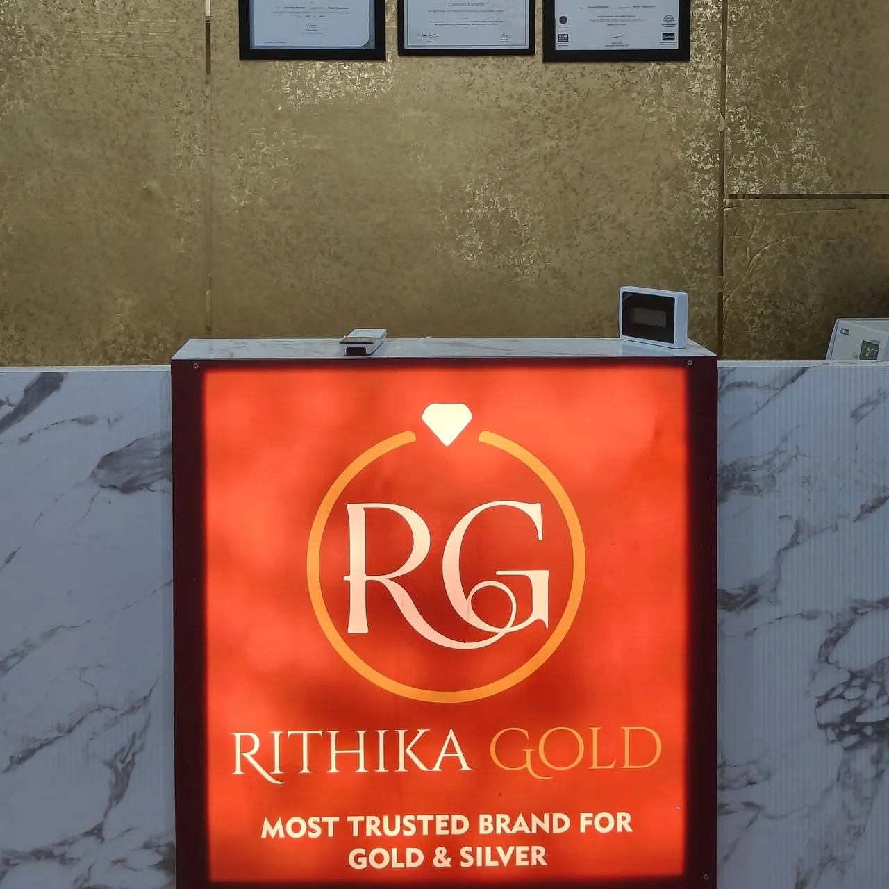 Rithika Gold Most Trusted Brand for Gold and Silver — signage at Kukatpally Hyderabad office